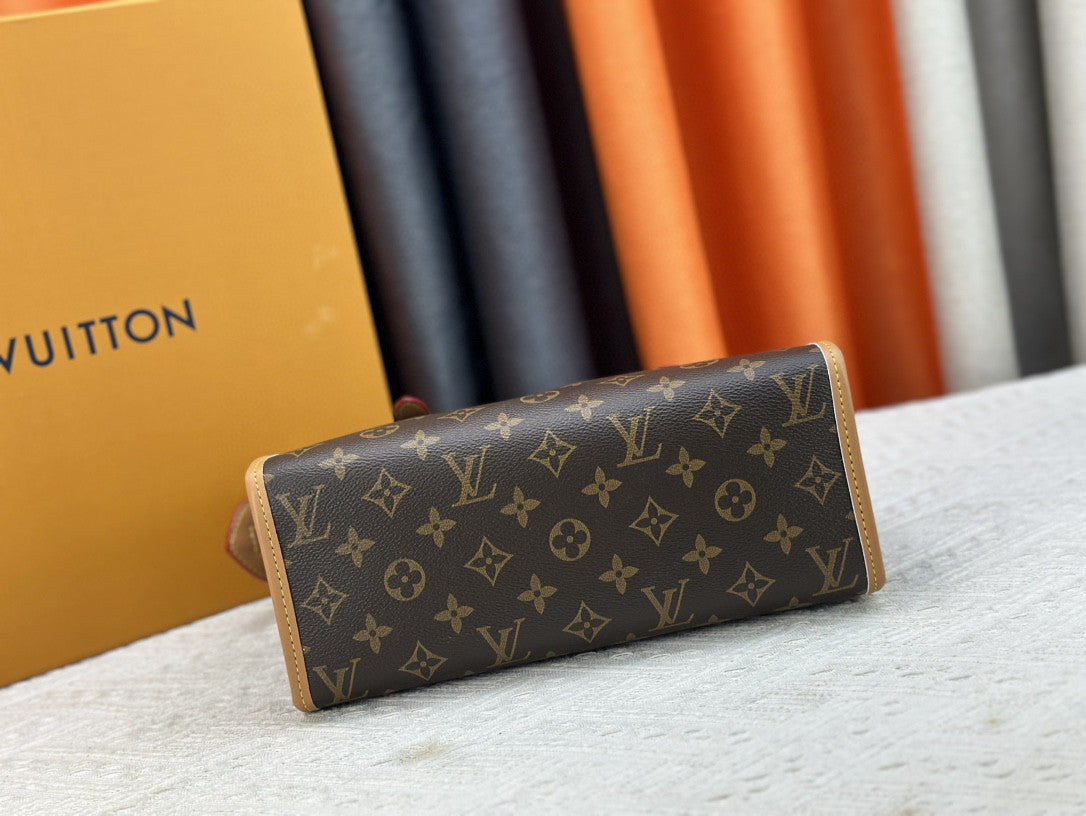 👜 Luxury Monogram Handbag
Elegant