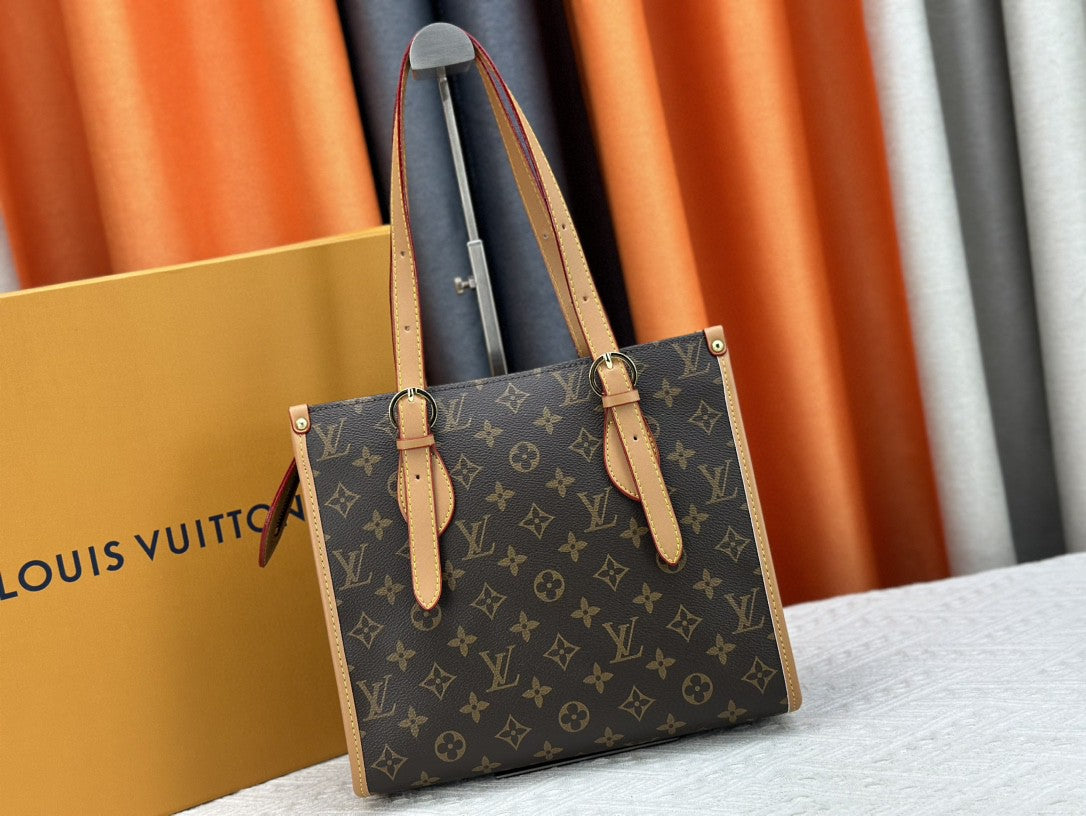 👜 Luxury Monogram Handbag
Elegant