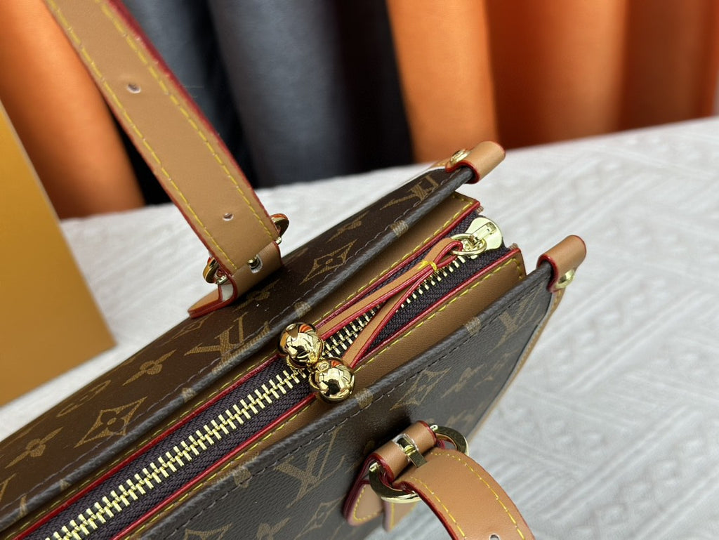 👜 Luxury Monogram Handbag
Elegant