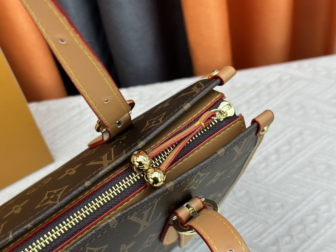 👜 Luxury Monogram Handbag
Elegant